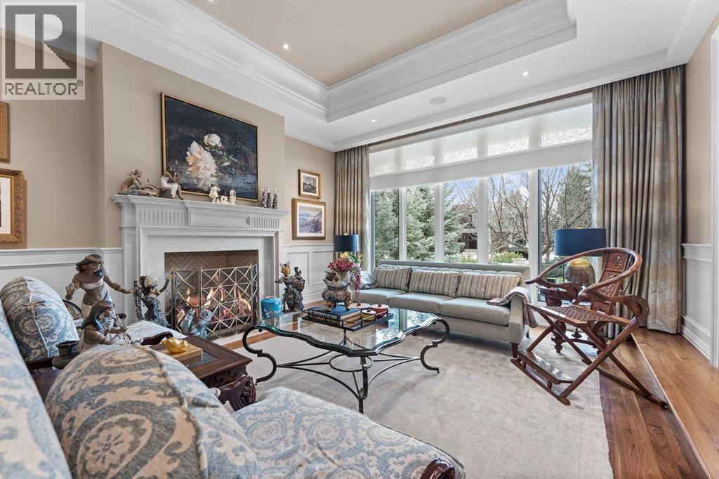 1020 Bel-Aire Drive, Calgary, AB - Indoor Photo Showing Living Room With Fireplace