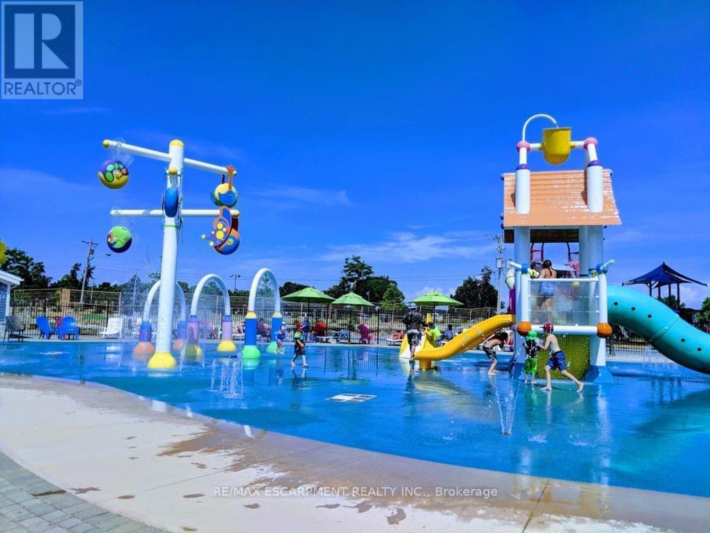 45 Quarry View Village, Port Colborne, ON - Outdoor With In Ground Pool