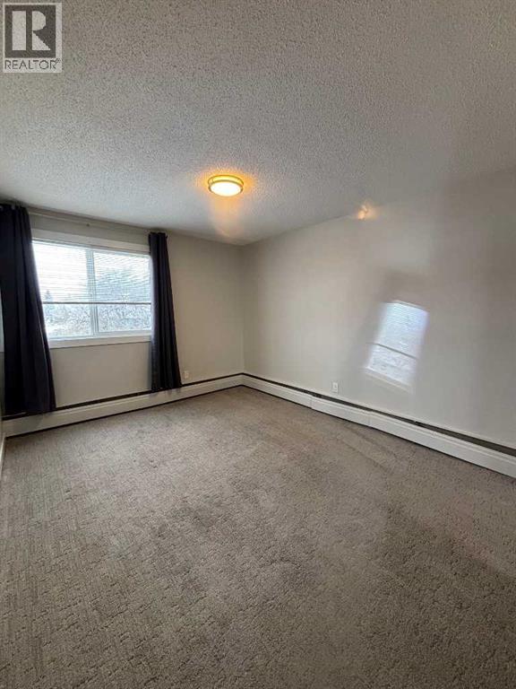 305, 9260 108 Avenue, Grande Prairie, AB - Indoor Photo Showing Other Room
