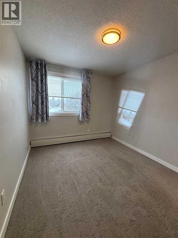 305, 9260 108 Avenue, Grande Prairie, AB - Indoor Photo Showing Other Room