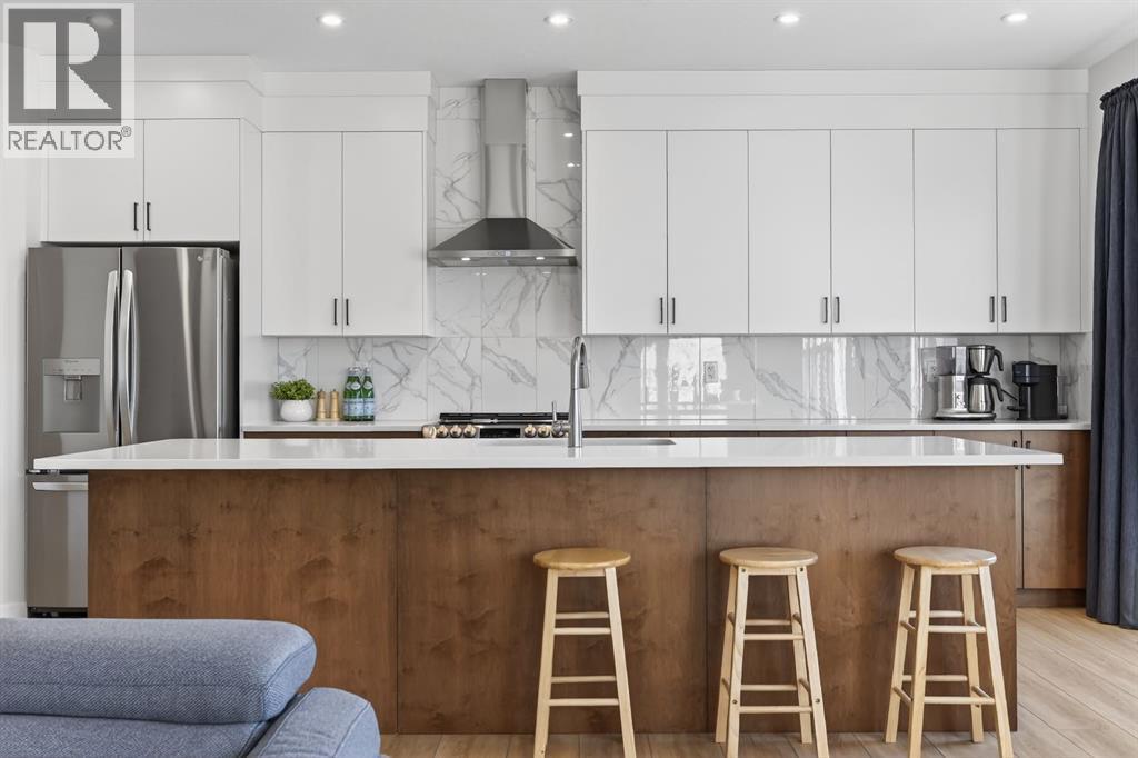 19 Rowley Park Nw, Calgary, AB - Indoor Photo Showing Kitchen With Upgraded Kitchen