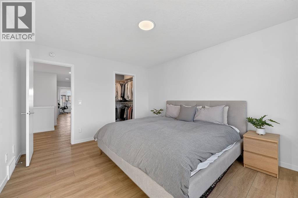 19 Rowley Park Nw, Calgary, AB - Indoor Photo Showing Bedroom