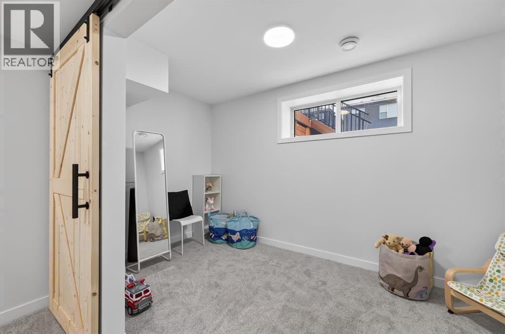 19 Rowley Park Nw, Calgary, AB - Indoor Photo Showing Other Room