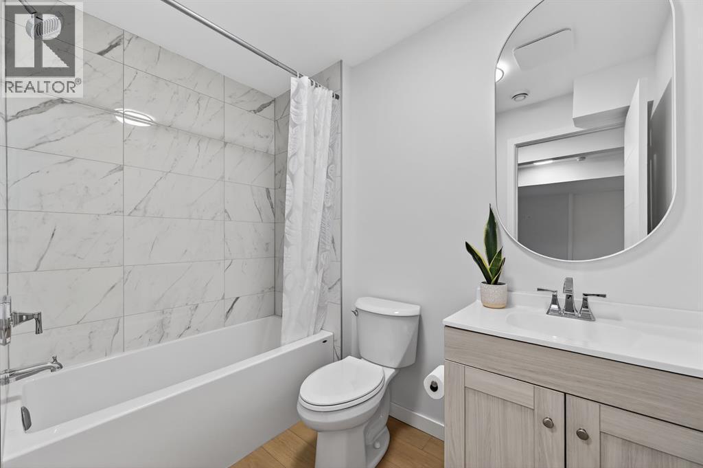 19 Rowley Park Nw, Calgary, AB - Indoor Photo Showing Bathroom