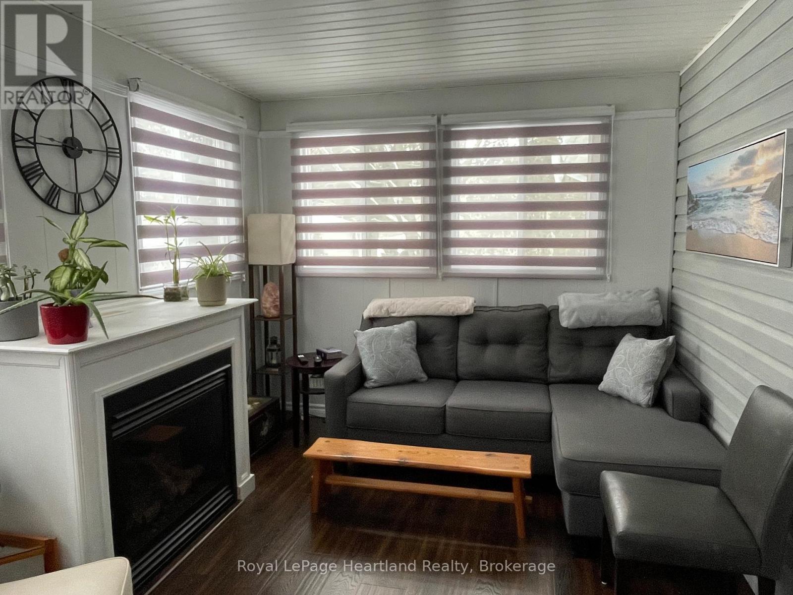 15 Huron Lane, Ashfield-Colborne-Wawanosh (Colborne), ON - Indoor Photo Showing Living Room With Fireplace