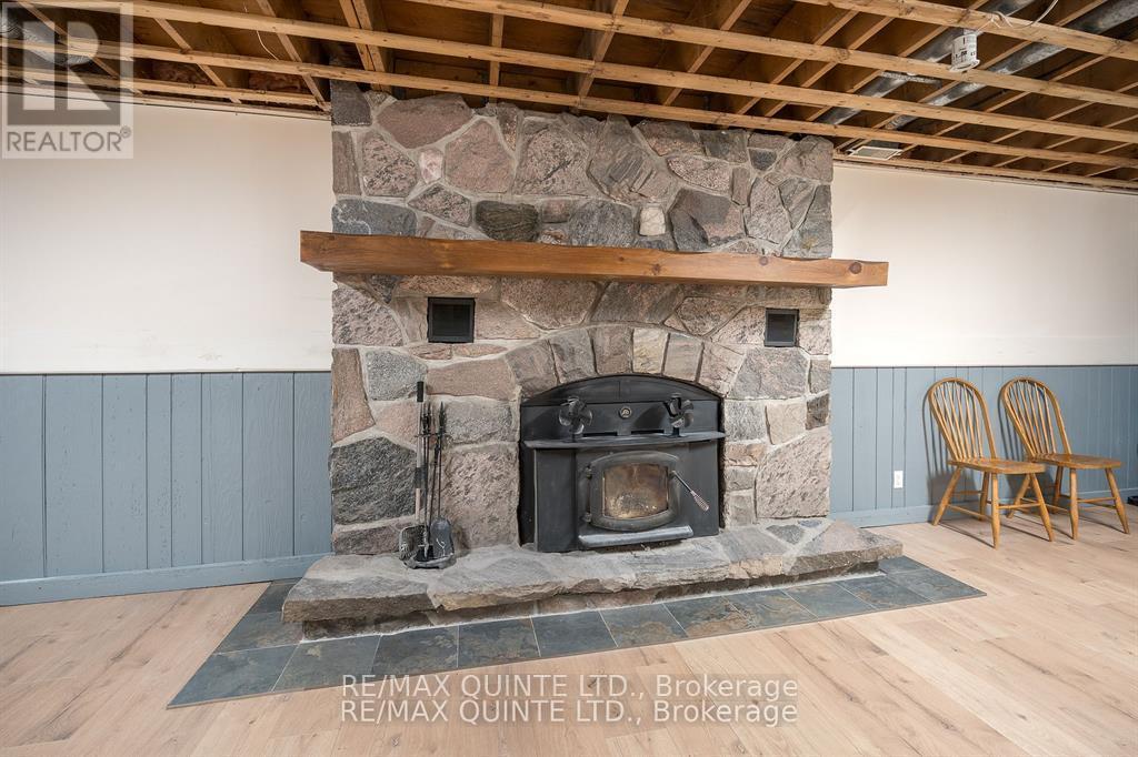 252 Maines Road, Tweed (Hungerford (Twp)), ON - Indoor Photo Showing Other Room With Fireplace