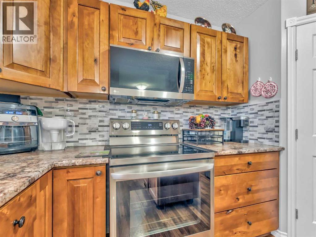12002 Range Road 65, Rural Cypress County, AB - Indoor Photo Showing Kitchen