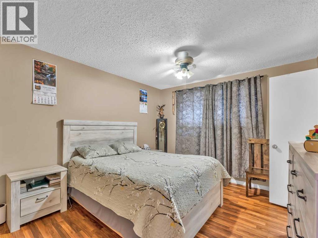 12002 Range Road 65, Rural Cypress County, AB - Indoor Photo Showing Bedroom