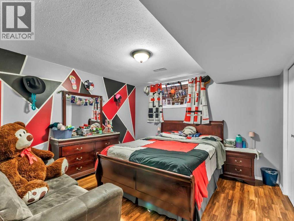 12002 Range Road 65, Rural Cypress County, AB - Indoor Photo Showing Bedroom