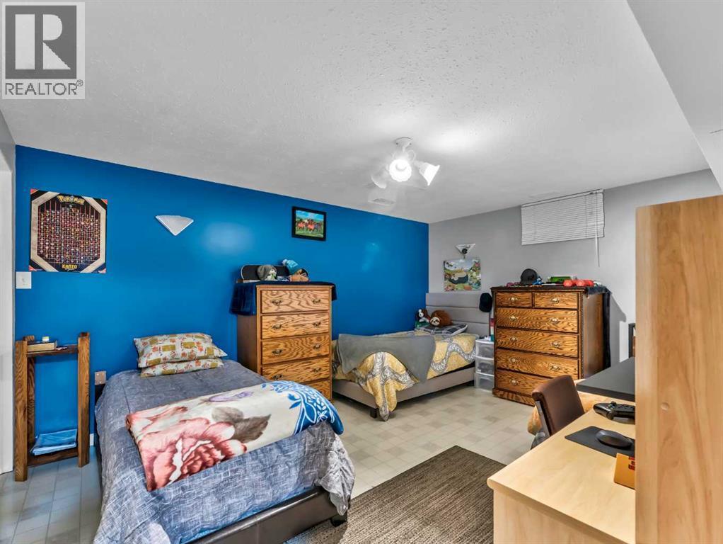 12002 Range Road 65, Rural Cypress County, AB - Indoor Photo Showing Bedroom