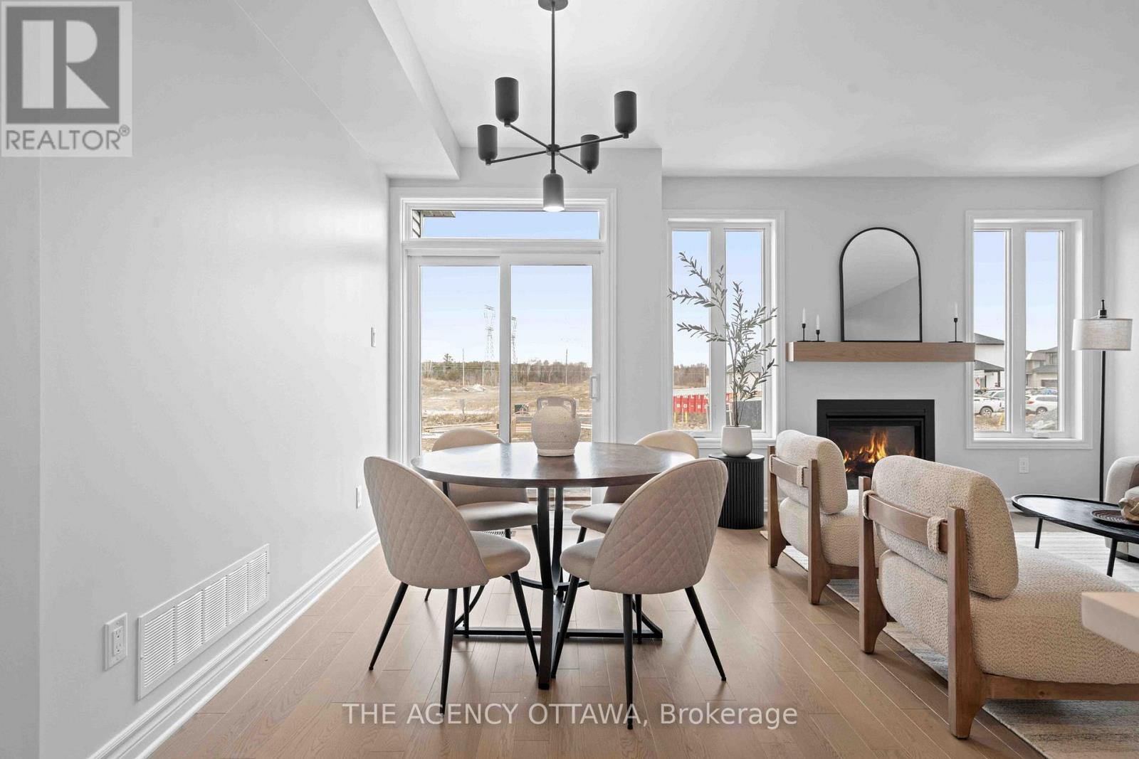 1150 Cope Drive, Ottawa, ON - Indoor Photo Showing Dining Room With Fireplace