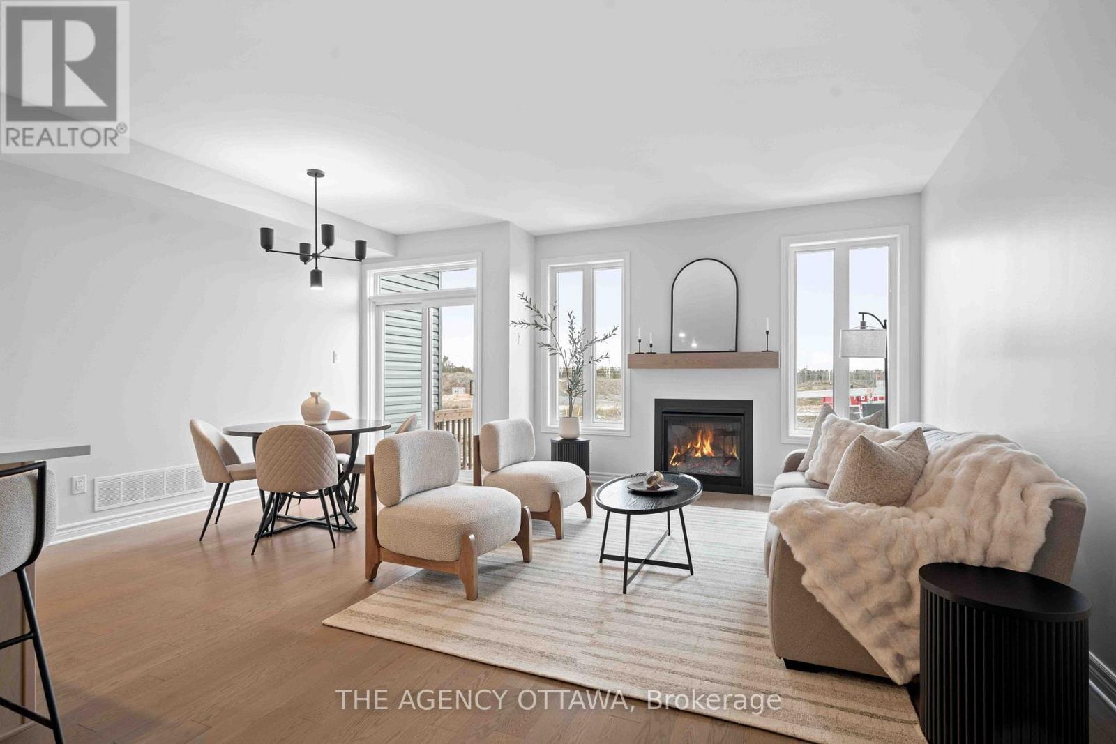 1150 Cope Drive, Ottawa, ON - Indoor Photo Showing Living Room With Fireplace