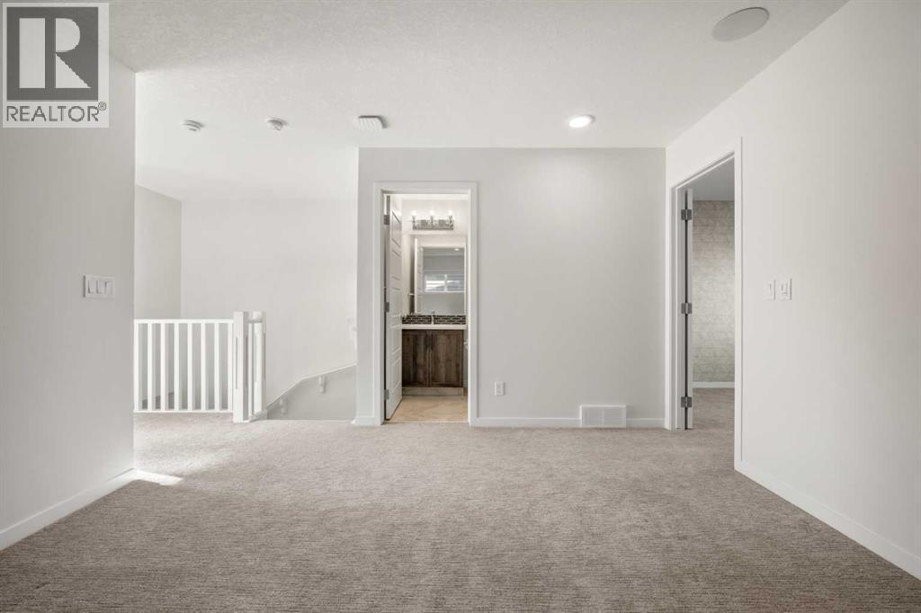 110 Wolf Creek Rise Se, Calgary, AB - Indoor Photo Showing Other Room