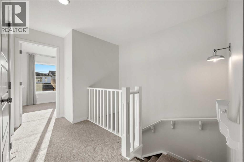 110 Wolf Creek Rise Se, Calgary, AB - Indoor Photo Showing Other Room