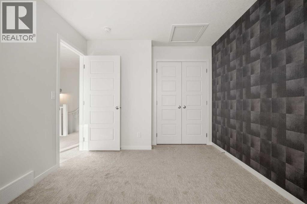 110 Wolf Creek Rise Se, Calgary, AB - Indoor Photo Showing Other Room