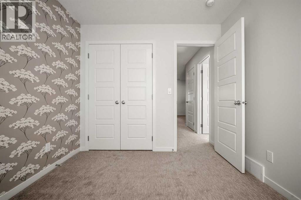 110 Wolf Creek Rise Se, Calgary, AB - Indoor Photo Showing Other Room