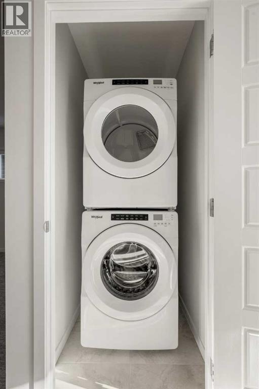 110 Wolf Creek Rise Se, Calgary, AB - Indoor Photo Showing Laundry Room