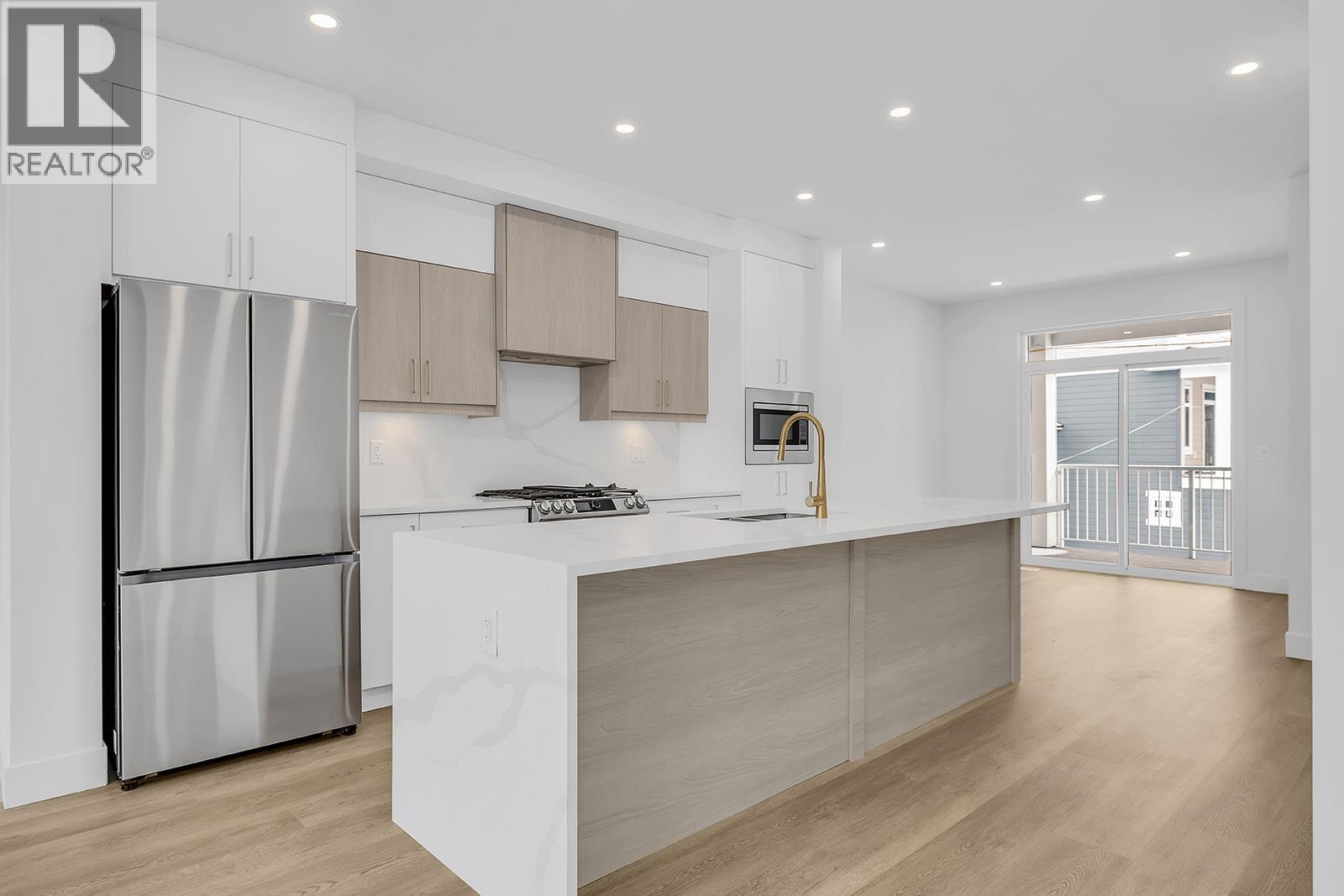 Photo of a similar home in the community. - 5300 Main Street Unit# 103, Kelowna, BC - Indoor Photo Showing Kitchen With Upgraded Kitchen