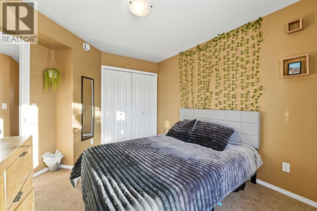 1216, 31 Jamieson Avenue, Red Deer, AB - Indoor Photo Showing Bedroom