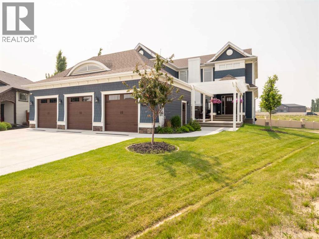 245 Prairie Rose Place S, Lethbridge, AB - Outdoor With Deck Patio Veranda With Facade