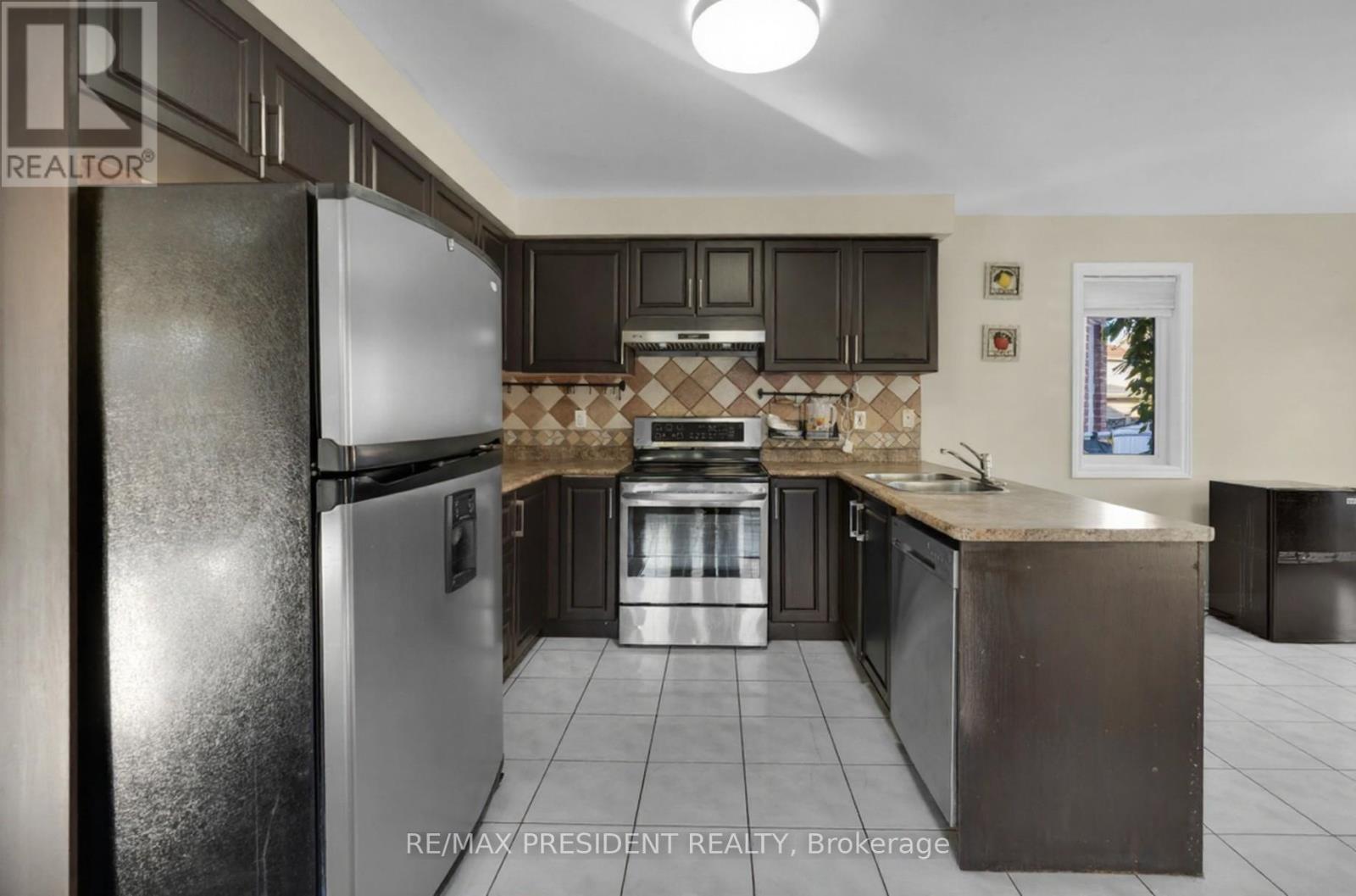 41 Fallstar Crescent, Brampton, ON - Indoor Photo Showing Kitchen With Stainless Steel Kitchen With Double Sink