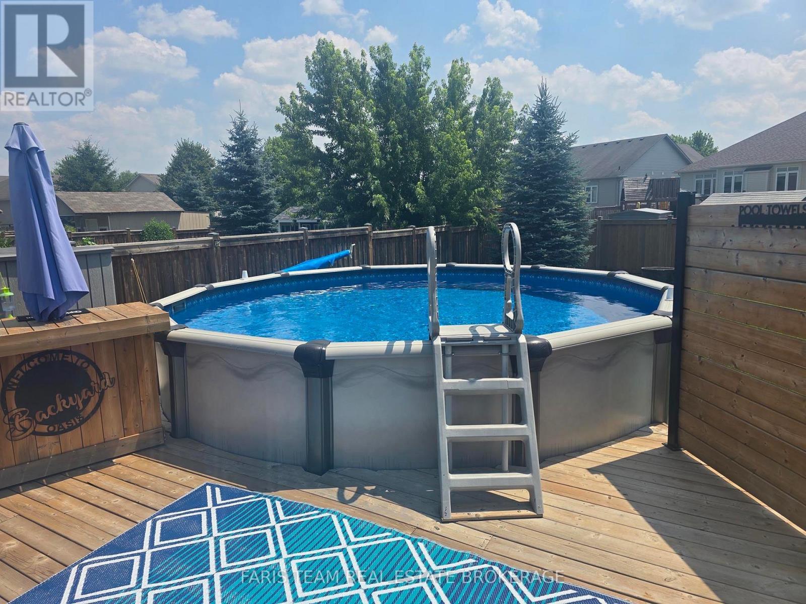 9 Broadpoint Street, Wasaga Beach, ON - Outdoor With Above Ground Pool