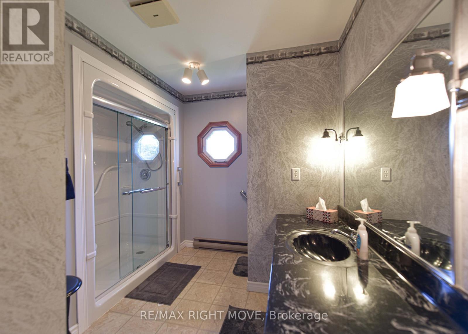 3 piece washroom on main level - 2723 Monck Road, Ramara, ON - Indoor Photo Showing Bathroom