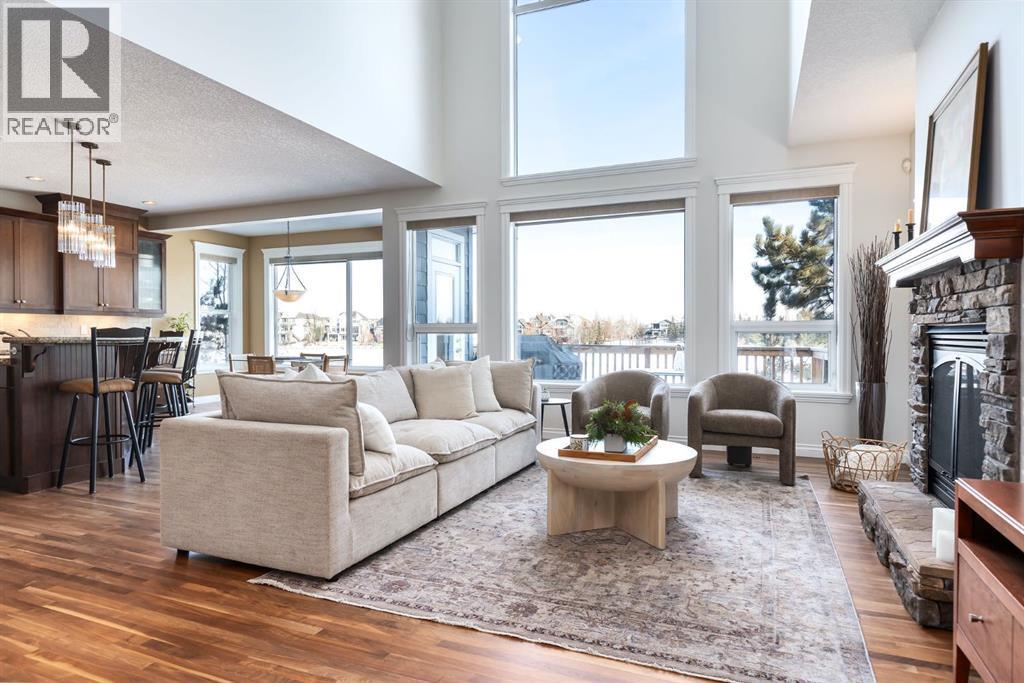 82 Auburn Sound Landing Se, Calgary, AB - Indoor Photo Showing Living Room With Fireplace