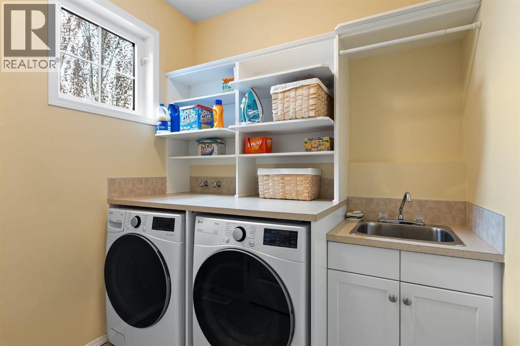 82 Auburn Sound Landing Se, Calgary, AB - Indoor Photo Showing Laundry Room