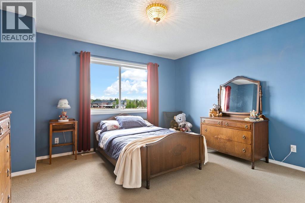 82 Auburn Sound Landing Se, Calgary, AB - Indoor Photo Showing Bedroom