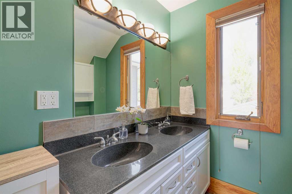 Bathroom with dual vanity - 1512 33 Avenue Sw, Calgary, AB - Indoor Photo Showing Bathroom