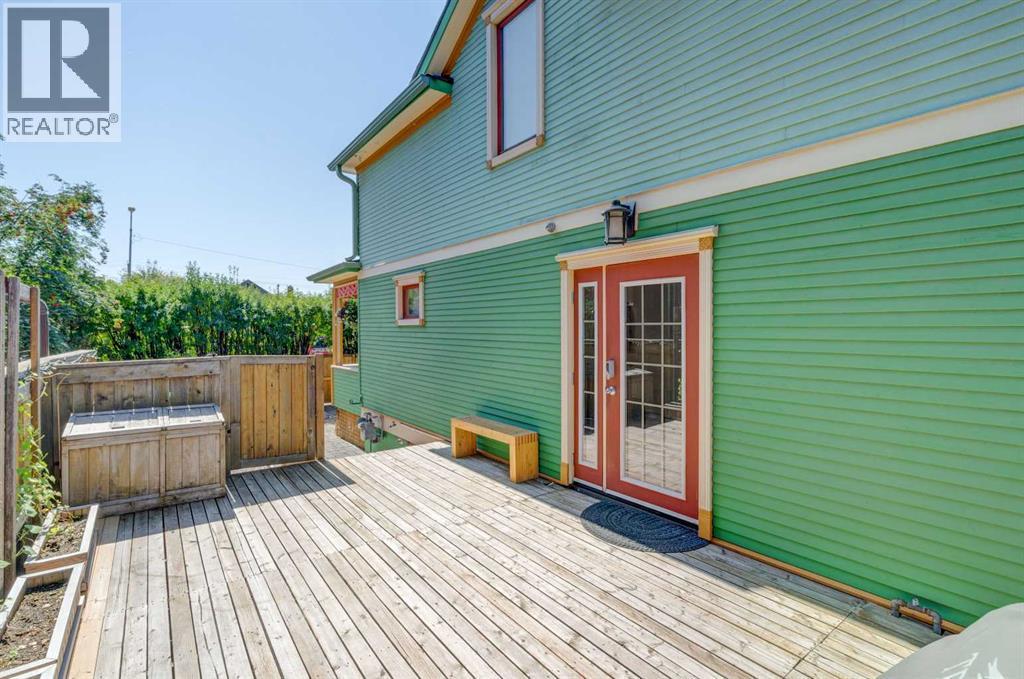 side yard with tons of sunshine - 1512 33 Avenue Sw, Calgary, AB - Outdoor With Deck Patio Veranda With Exterior