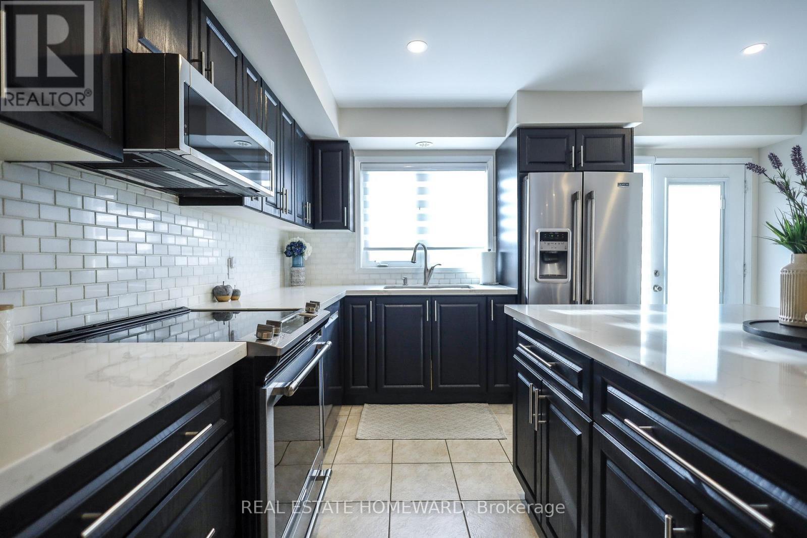 51 - 5650 Winston Churchill Boulevard, Mississauga, ON - Indoor Photo Showing Kitchen With Upgraded Kitchen
