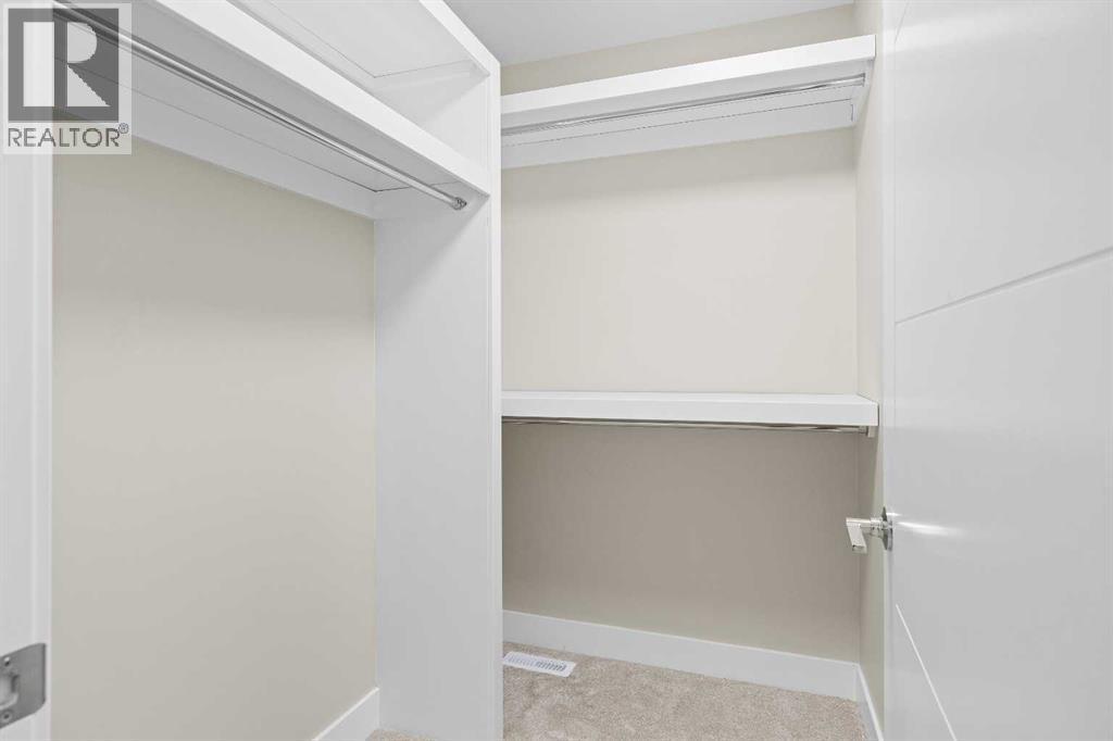 56 Bridges Drive, Langdon, AB - Indoor Photo Showing Other Room