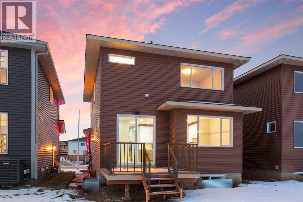 56 Bridges Drive, Langdon, AB - Outdoor With Exterior