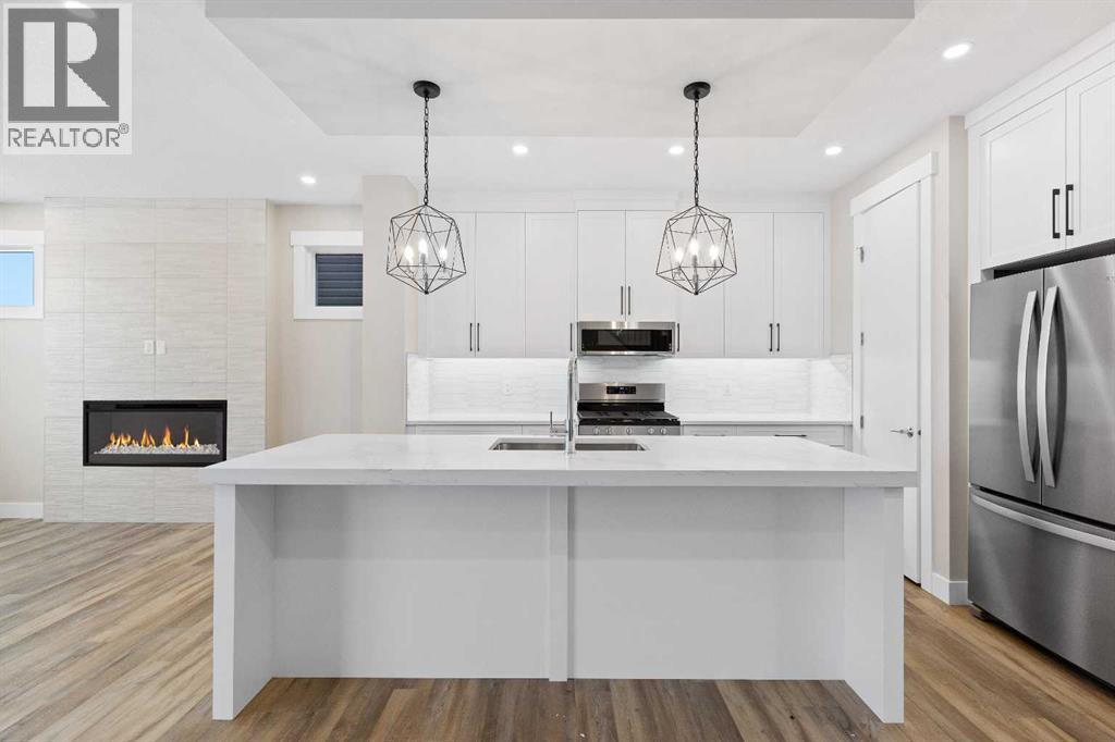 56 Bridges Drive, Langdon, AB - Indoor Photo Showing Kitchen With Upgraded Kitchen