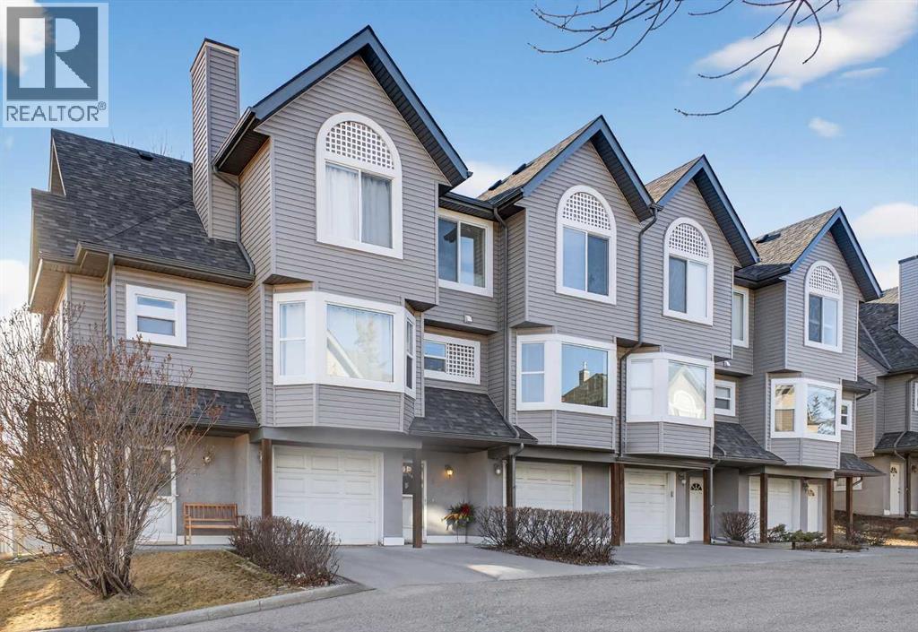 41 Sandarac Villas Nw, Calgary, AB - Outdoor With Facade