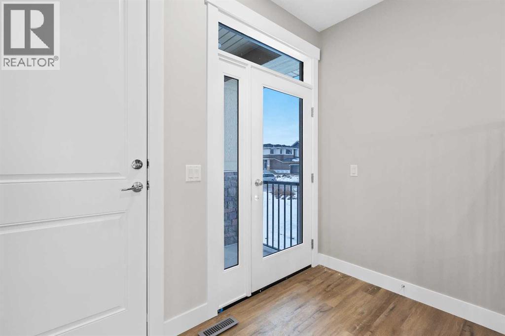 60 Bridges Drive, Langdon, AB - Indoor Photo Showing Other Room