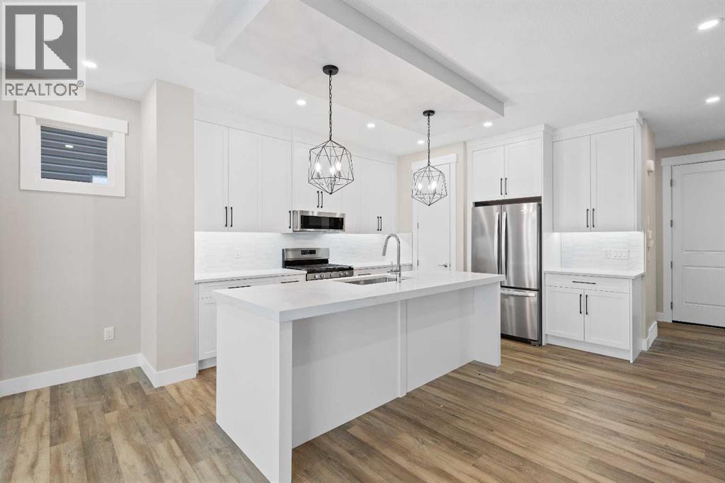 60 Bridges Drive, Langdon, AB - Indoor Photo Showing Kitchen With Upgraded Kitchen