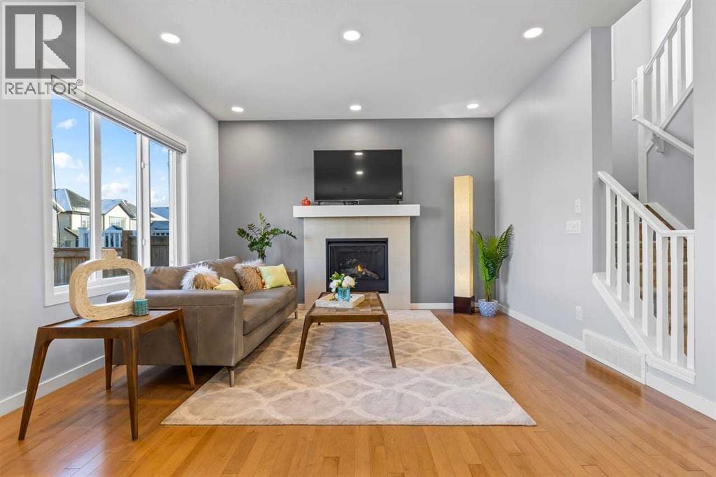 184 Masters Rise Se, Calgary, AB - Indoor Photo Showing Other Room With Fireplace