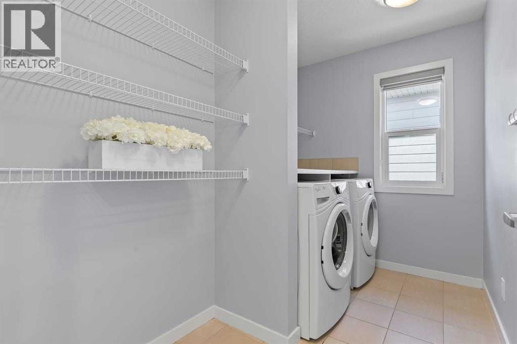 184 Masters Rise Se, Calgary, AB - Indoor Photo Showing Laundry Room
