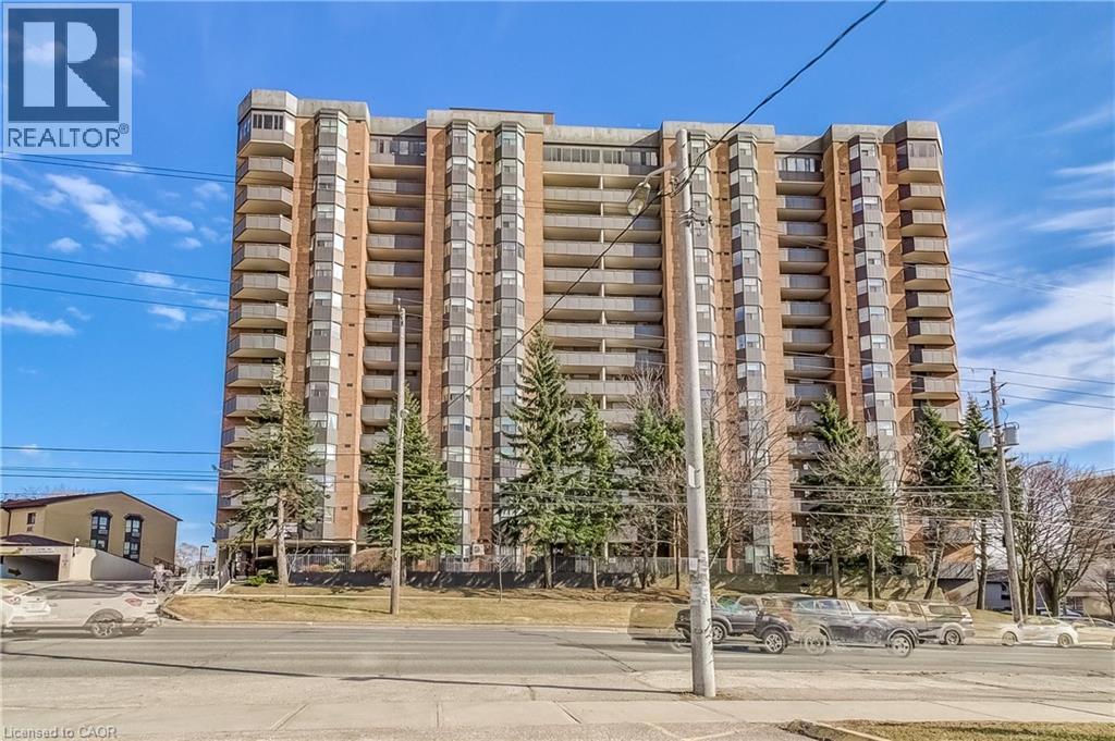 View of apartment building / complex - 3845 Lakeshore Boulevard W Unit# 804, Etobicoke, ON - Outdoor With Balcony With Facade
