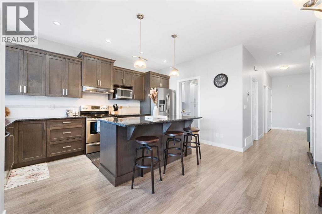 153 Williamstown Park Nw, Airdrie, AB - Indoor Photo Showing Kitchen With Upgraded Kitchen
