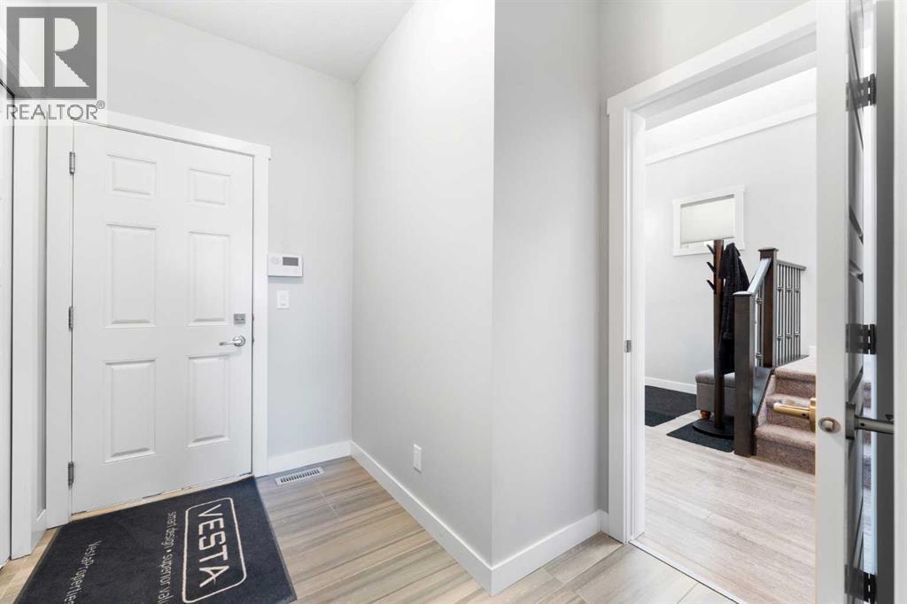 153 Williamstown Park Nw, Airdrie, AB - Indoor Photo Showing Other Room