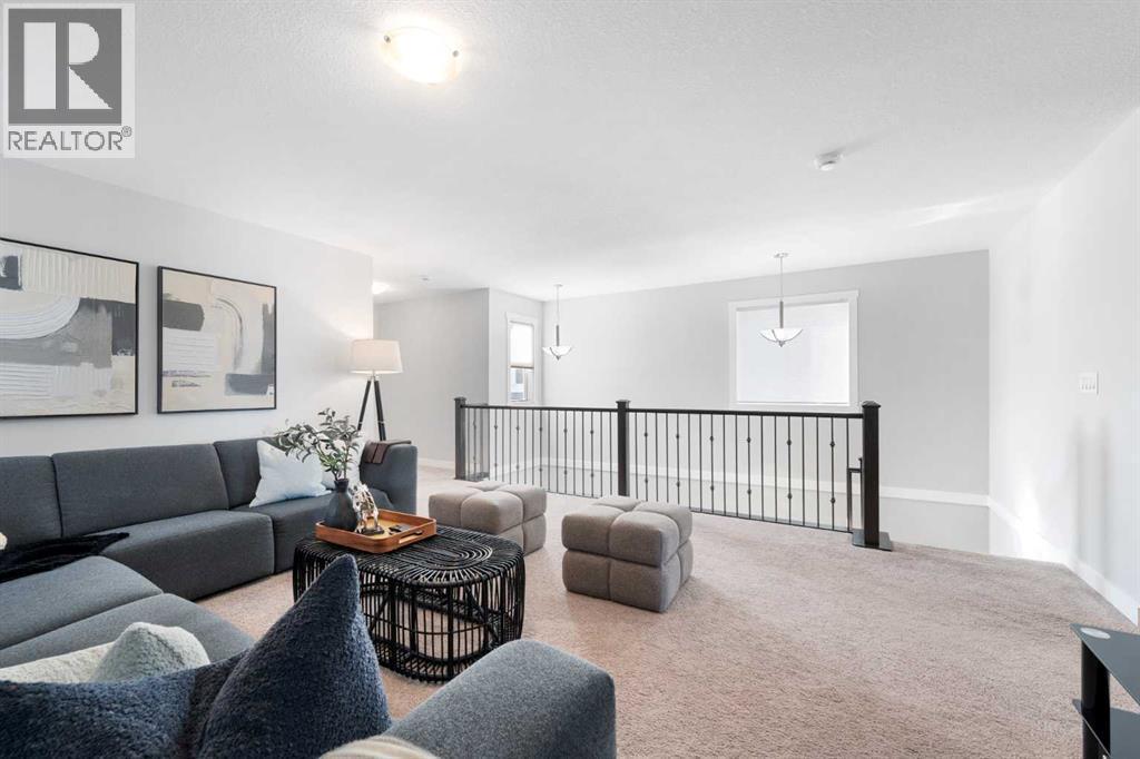153 Williamstown Park Nw, Airdrie, AB - Indoor Photo Showing Living Room