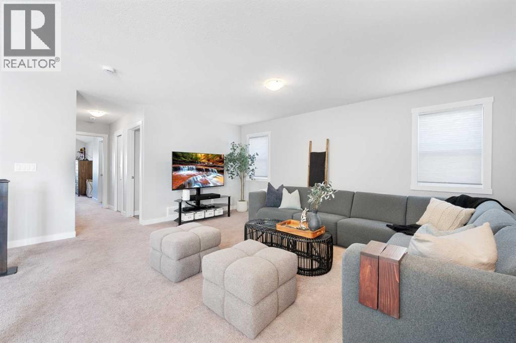 153 Williamstown Park Nw, Airdrie, AB - Indoor Photo Showing Living Room