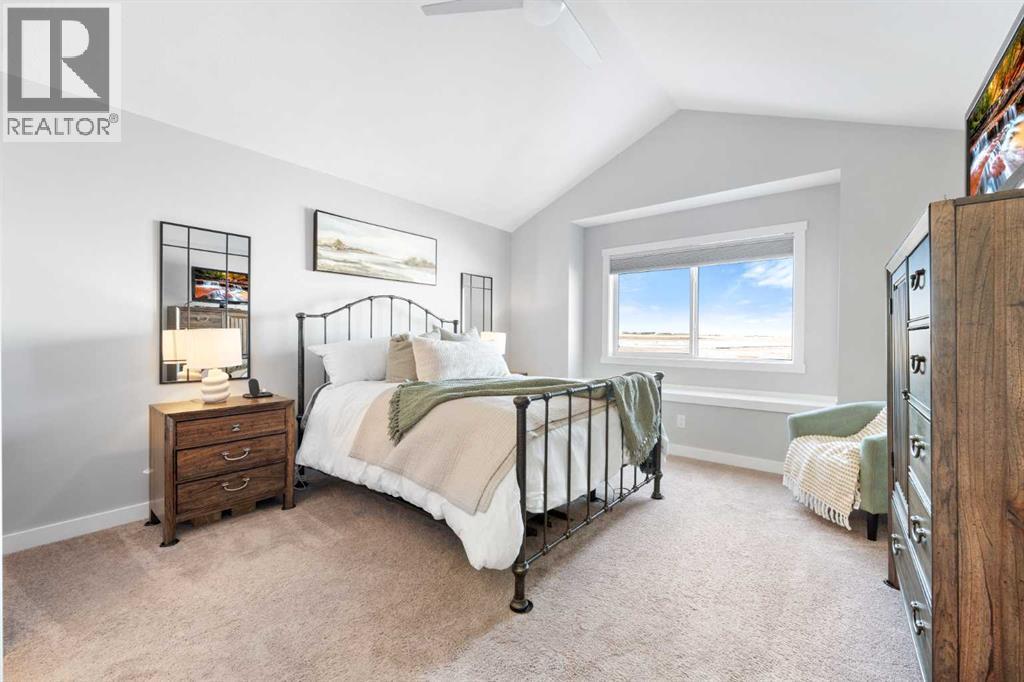 153 Williamstown Park Nw, Airdrie, AB - Indoor Photo Showing Bedroom