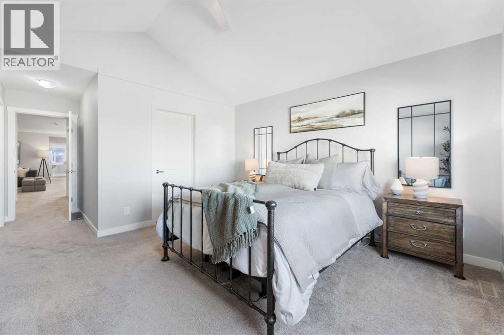 153 Williamstown Park Nw, Airdrie, AB - Indoor Photo Showing Bedroom