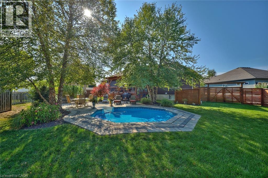 49 Postma Drive, Dunnville, ON - Outdoor With In Ground Pool With Backyard