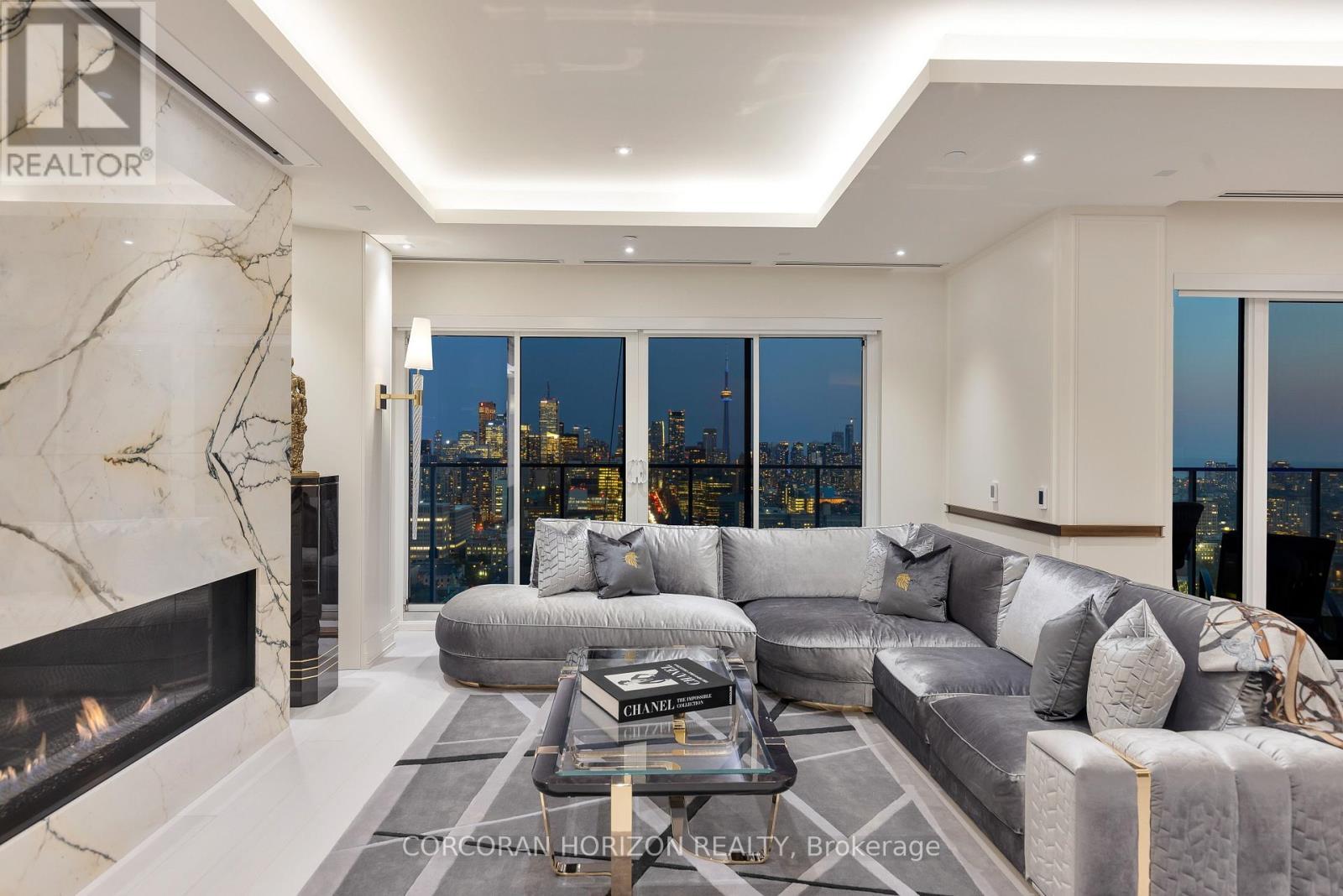 3802 - 200 Cumberland Street, Toronto, ON - Indoor Photo Showing Living Room With Fireplace